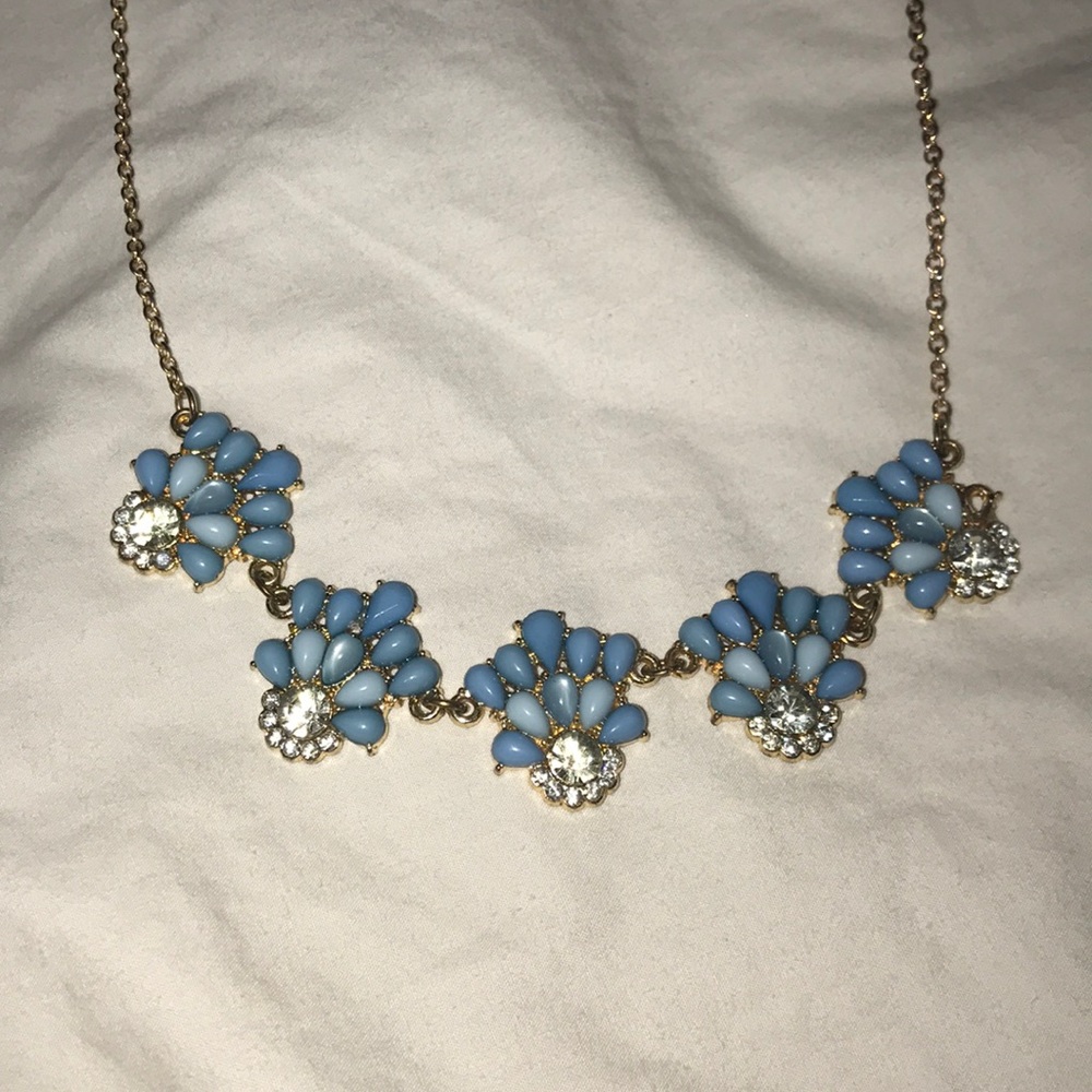 Gold necklace with blue charms